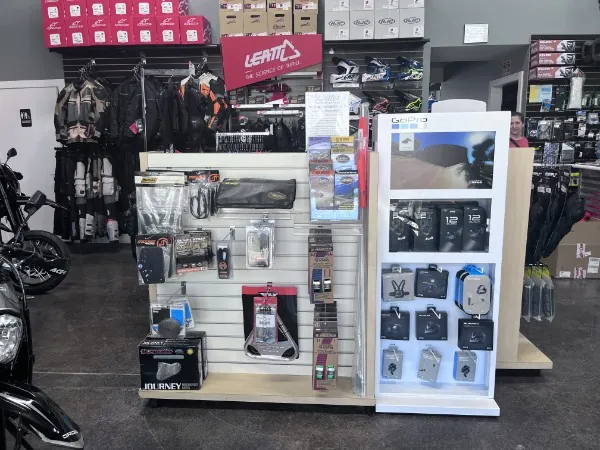 Parts and accessories display shelf inside the Fastback Moto shop